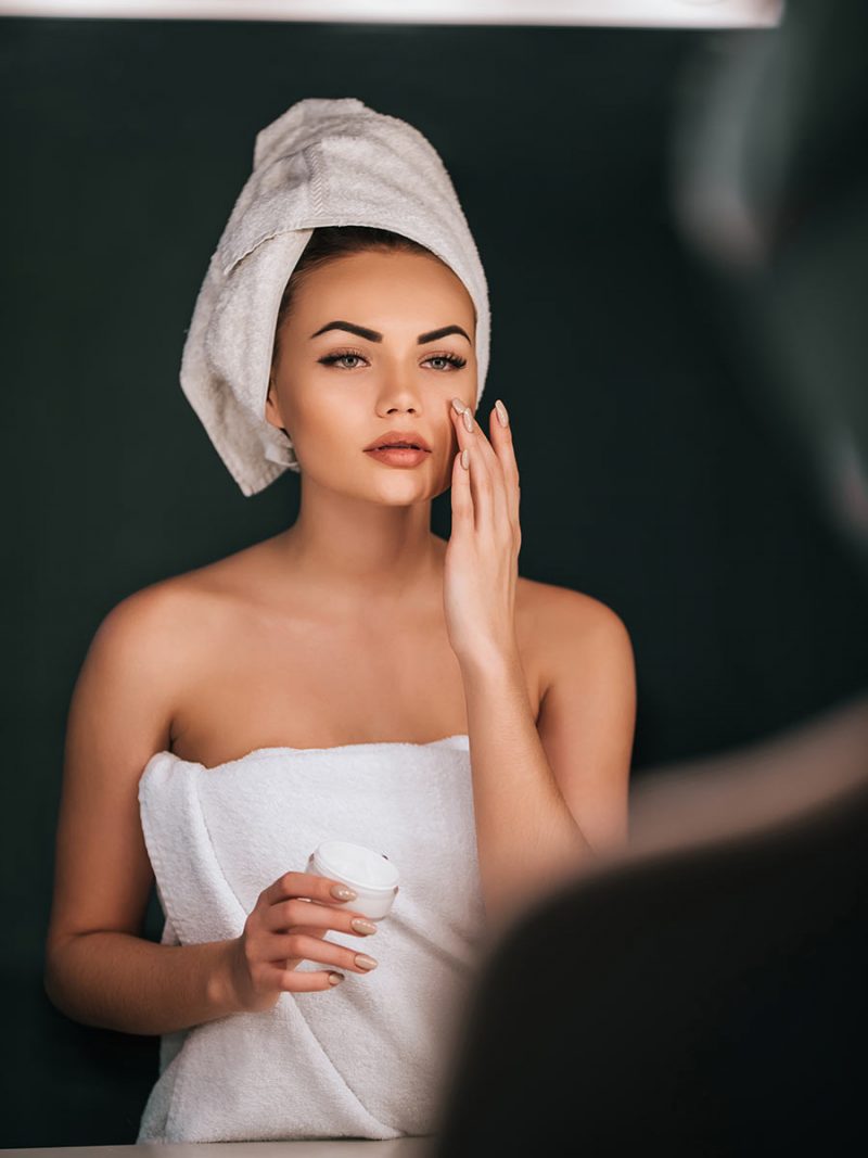 Beautiful woman in the mirror