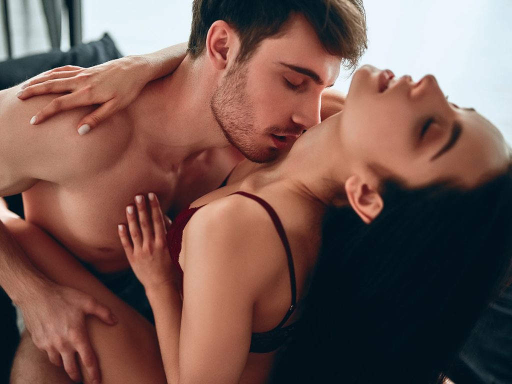 couple-having-fun-sensual-date-in-bed