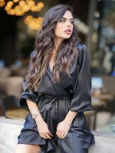 Elegant single woman in black dress